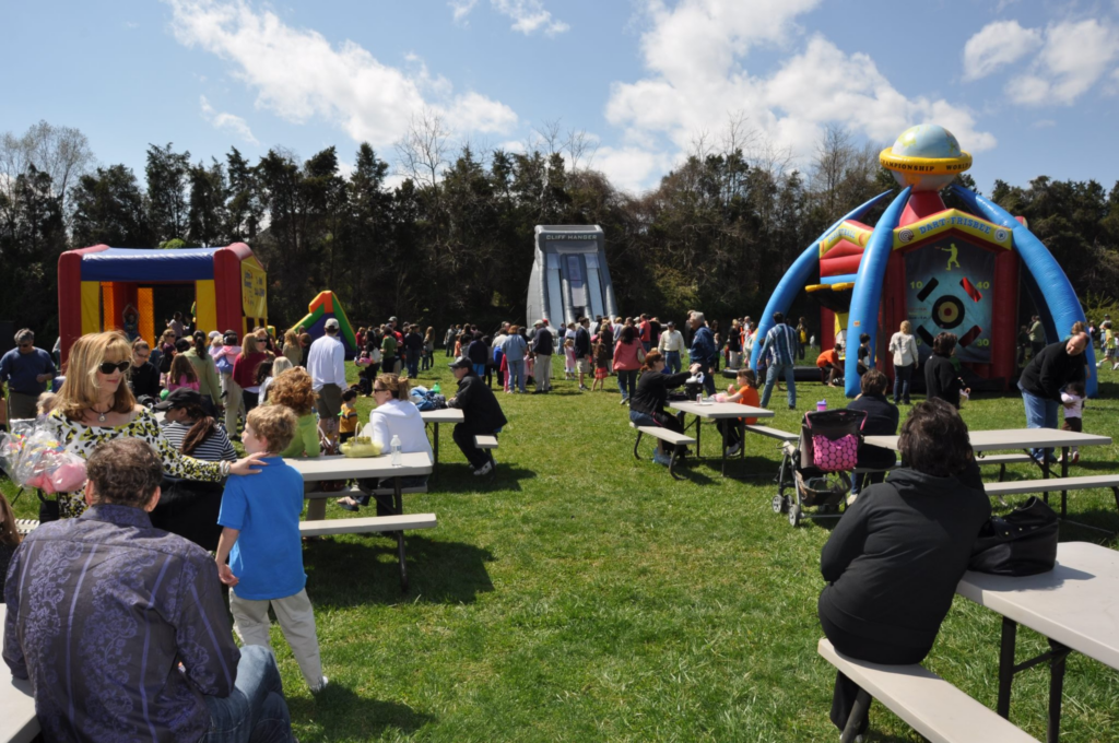 moon bounces, inflatable slides and other inflatable rentals at a large event in Fairfax, VA
