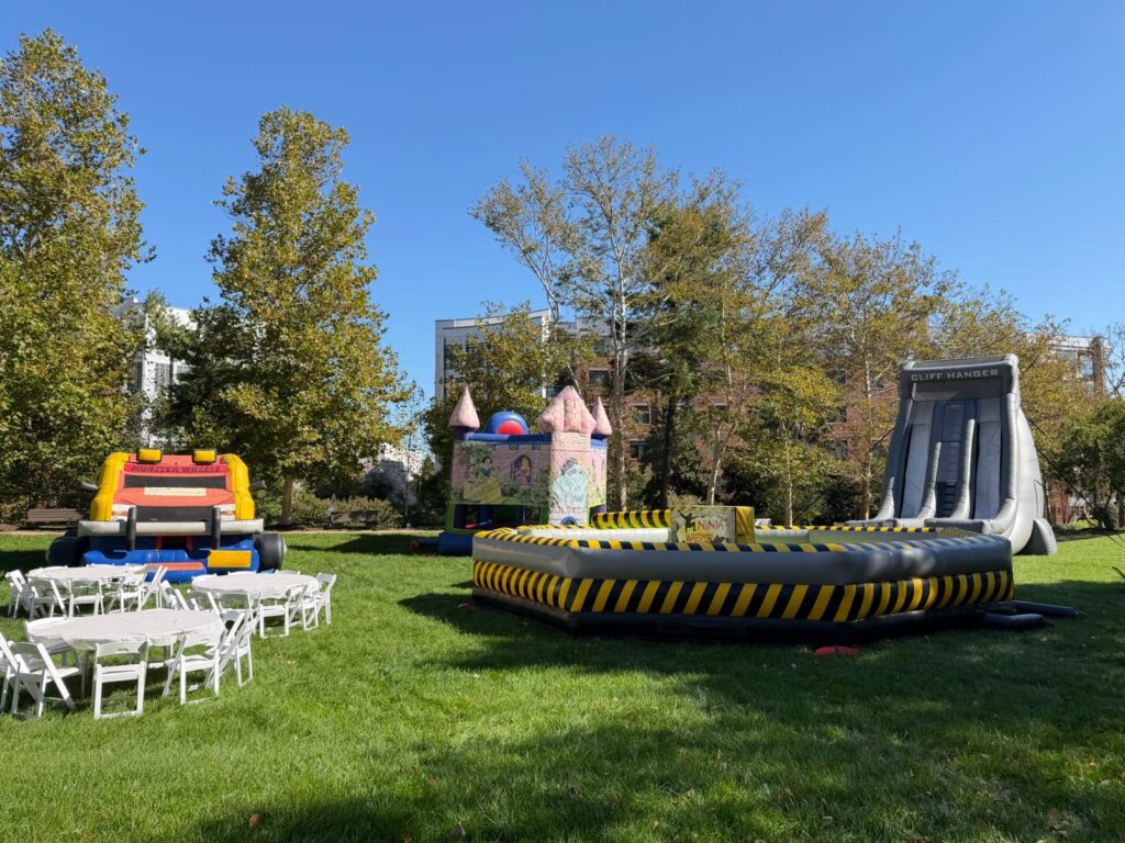 moon bounces, slides and a mechanical bull for a festival in Arlington, VA
