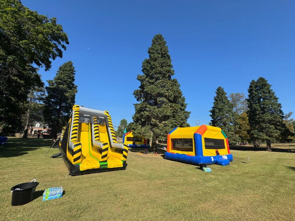A bounce house and giant inflatable slide rented for a party in Mclean, Virginia